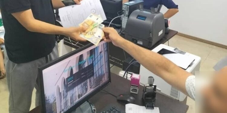 Guichet Banque d'Algérie allocation touristique port Béjaia